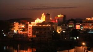Diwali celebration in Udaipur: Lake Pichola and heritage palaces illuminated with festive lights and diyas
