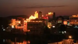 Diwali celebration in Udaipur: Lake Pichola and heritage palaces illuminated with festive lights and diyas