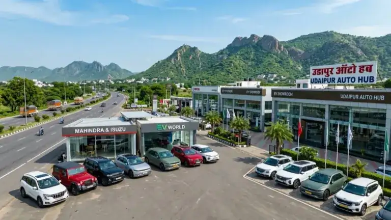 Automotive dealerships, modern SUVs and EV showrooms along the Aravalli corridor in Udaipur Rajasthan