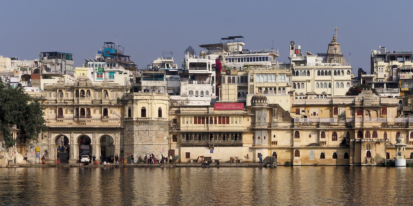 Architecture of Udaipur Pichola havelis: Bagore Ki Haveli, stone jharokhas, and heritage courtyards along Lake Pichola