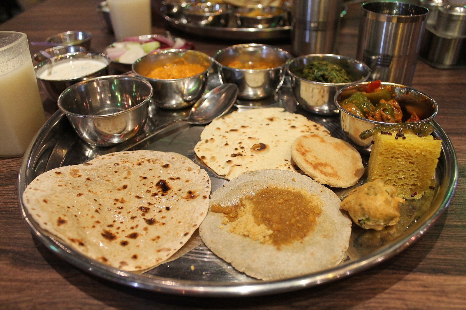 Udaipur winter food guide: Traditional Rajasthani thali, Dal Baati Churma, and lakefront dining specialties